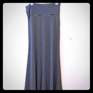 Full length, black striped skirt